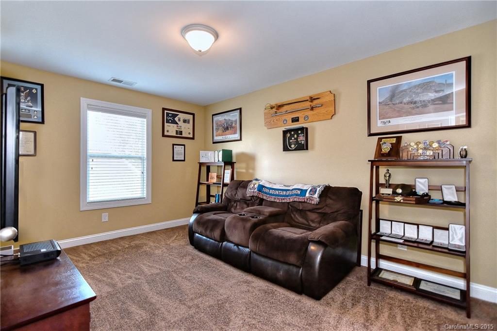 3321 Bridgewick Road Waxhaw, NC 28173 - Photo 13 of 24 a living room with furniture and a window