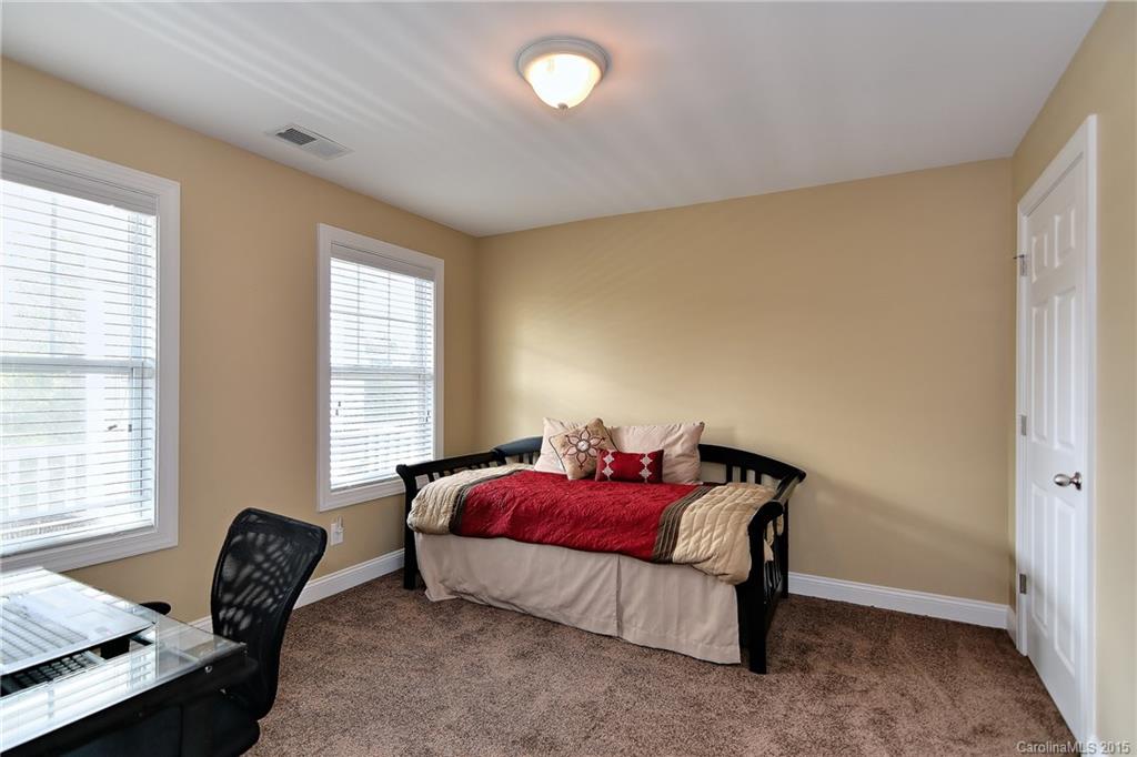 3321 Bridgewick Road Waxhaw, NC 28173 - Photo 14 of 24 a bedroom with a bed and a window