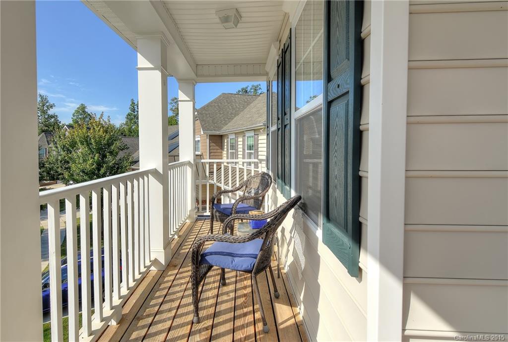 3321 Bridgewick Road Waxhaw, NC 28173 - Photo 16 of 24 a view of balcony with wooden floor and outdoor seating