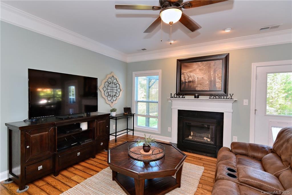 3321 Bridgewick Road Waxhaw, NC 28173 - Photo 4 of 24 a living room with furniture and a fireplace