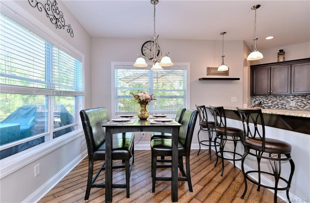 3321 Bridgewick Road Waxhaw, NC 28173 - Photo 8 of 24 a view of a dining room with furniture window and outside view