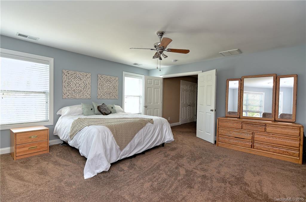 3321 Bridgewick Road Waxhaw, NC 28173 - Photo 10 of 24 a spacious bedroom with a bed and a large window