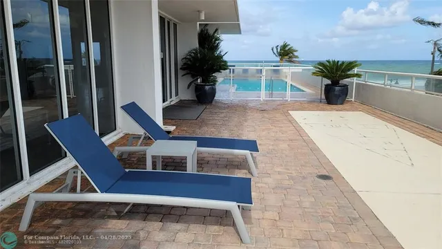 a kitchen with a table and chairs in it