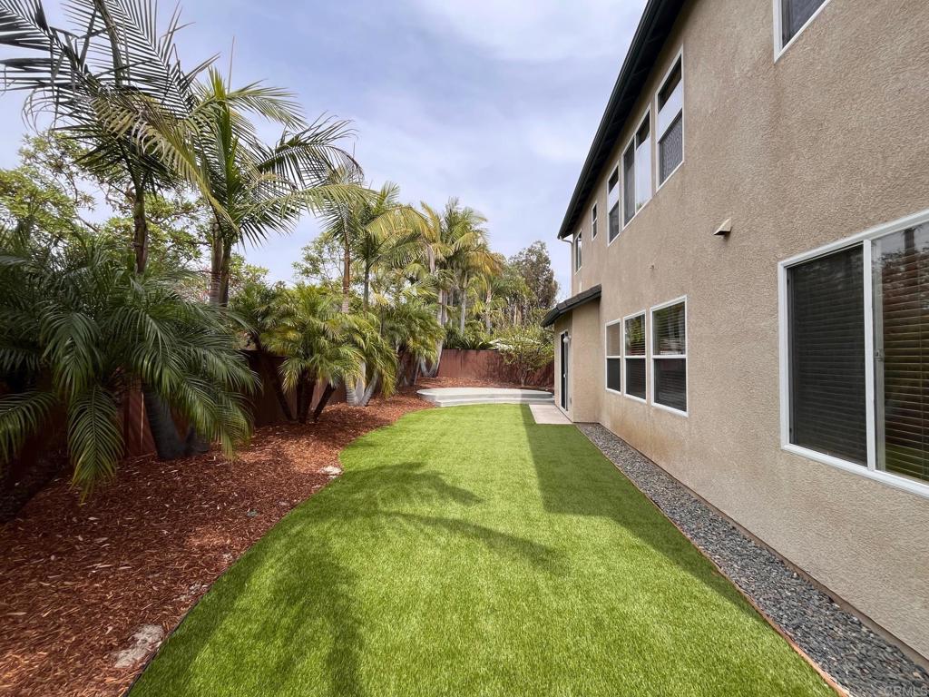3840 Stoneridge Road Carlsbad, CA 92010 - Photo 32 of 36 a view of yard with swimming pool and sitting area