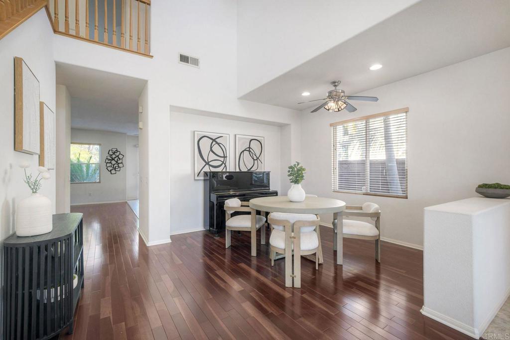 3840 Stoneridge Road Carlsbad, CA 92010 - Photo 7 of 36 a view of a dining room with furniture and wooden floor