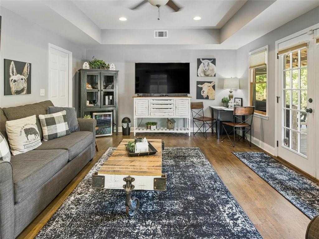 253 Happy Trails Way Jasper, GA 30143 - Photo 103 of 147 a living room with furniture and a flat screen tv