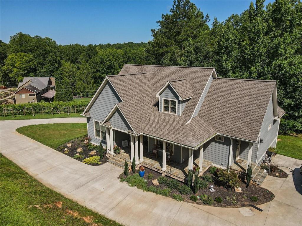 253 Happy Trails Way Jasper, GA 30143 - Photo 143 of 147 an aerial view of a house with a yard