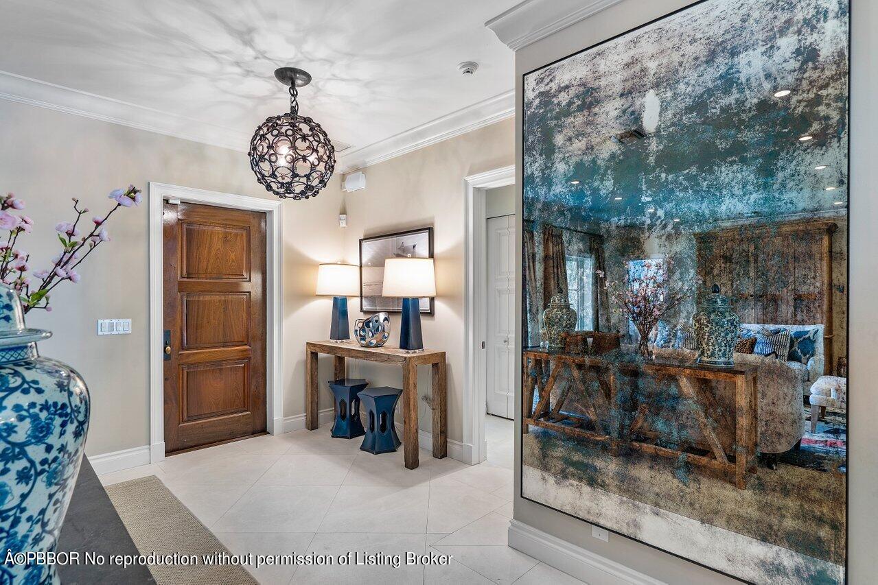 265 List Road Palm Beach, FL 33480 - Photo 4 of 39 a view of a dining room with furniture window and wooden floor