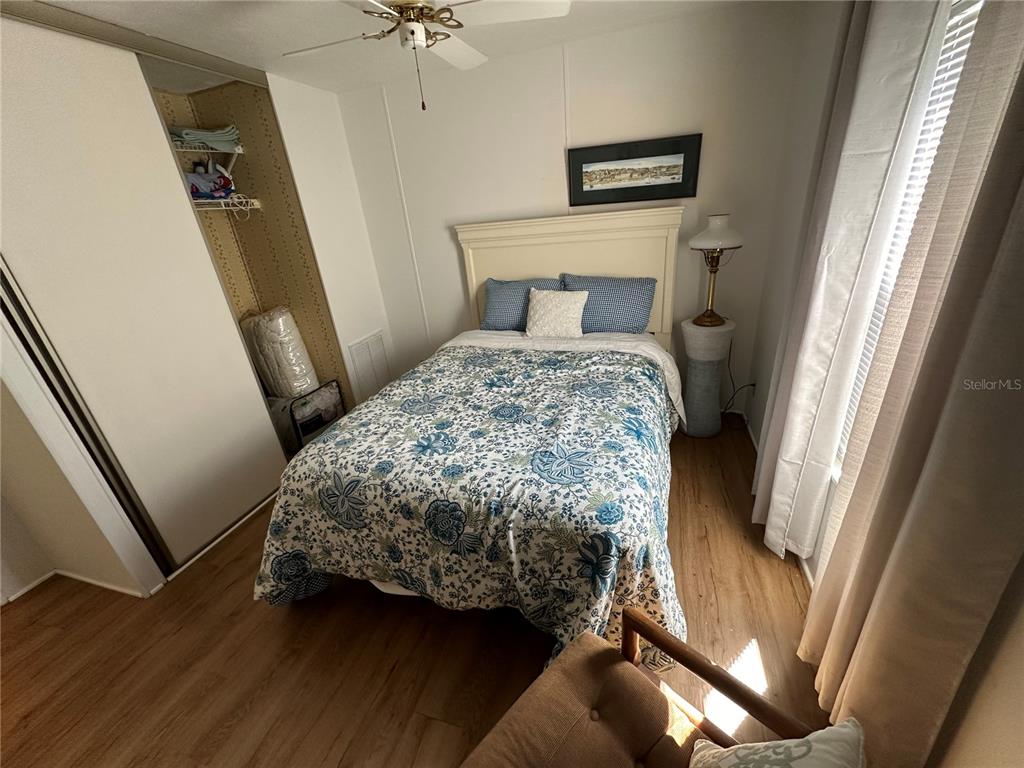 15550 Burnt Store Road, Unit 196 Punta Gorda, FL 33955 - Photo 20 of 62 a bedroom with a bed and a window