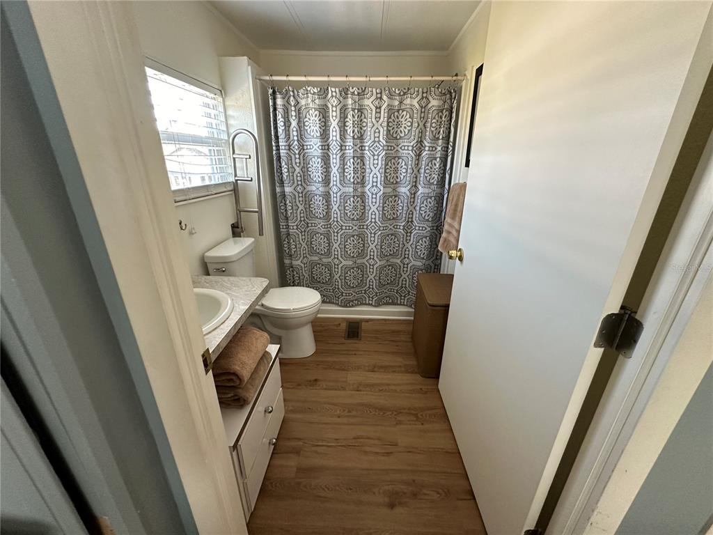 15550 Burnt Store Road, Unit 196 Punta Gorda, FL 33955 - Photo 24 of 62 a bathroom with a sink and a toilet