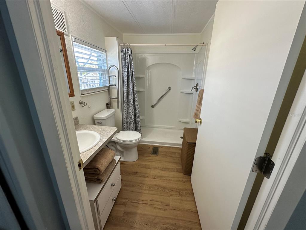 15550 Burnt Store Road, Unit 196 Punta Gorda, FL 33955 - Photo 25 of 62 a bathroom with a sink and toilet