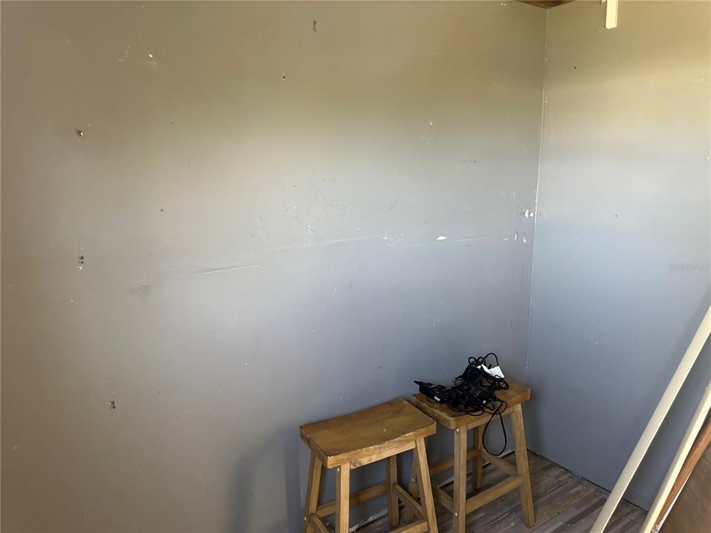 15550 Burnt Store Road, Unit 196 Punta Gorda, FL 33955 - Photo 32 of 62 a view of a room with table and chair