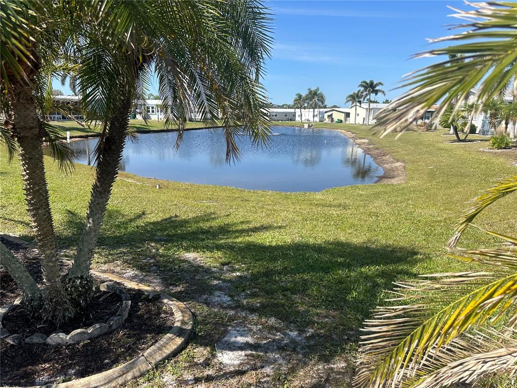 15550 Burnt Store Road, Unit 196 Punta Gorda, FL 33955 - Photo 39 of 62 a view of a yard with an outdoor space