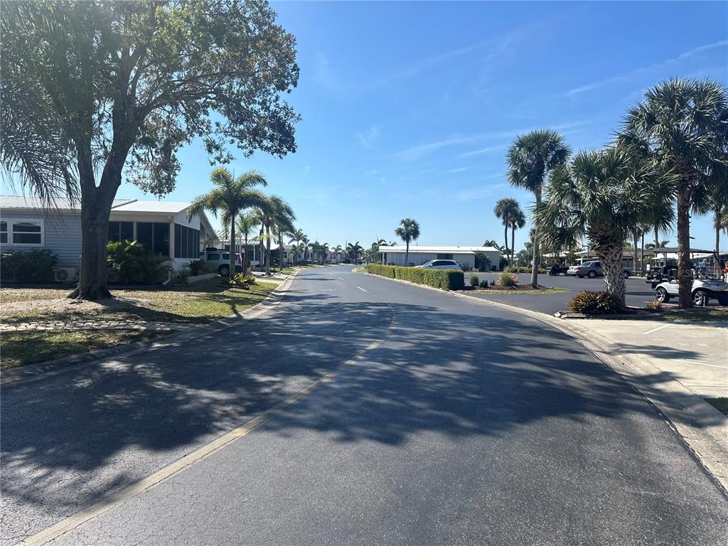 15550 Burnt Store Road, Unit 196 Punta Gorda, FL 33955 - Photo 41 of 62 a view of a house with a yard