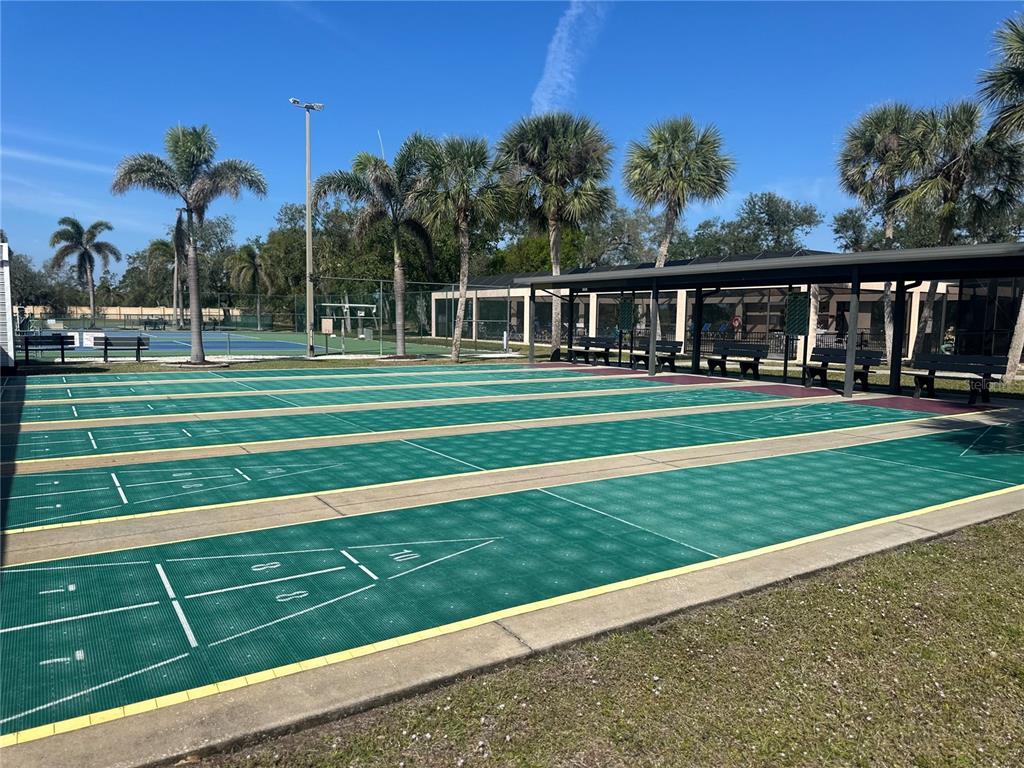 15550 Burnt Store Road, Unit 196 Punta Gorda, FL 33955 - Photo 47 of 62 a front view of a house with a yard