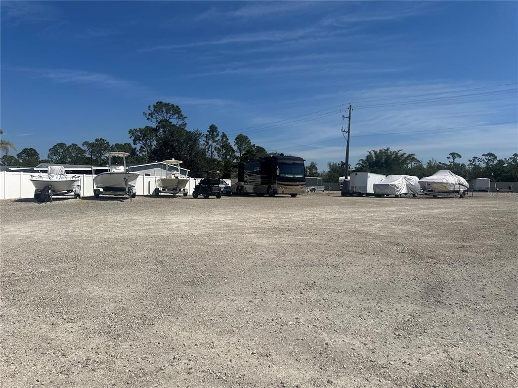 15550 Burnt Store Road, Unit 196 Punta Gorda, FL 33955 - Photo 57 of 62 a view of a car park next to a road