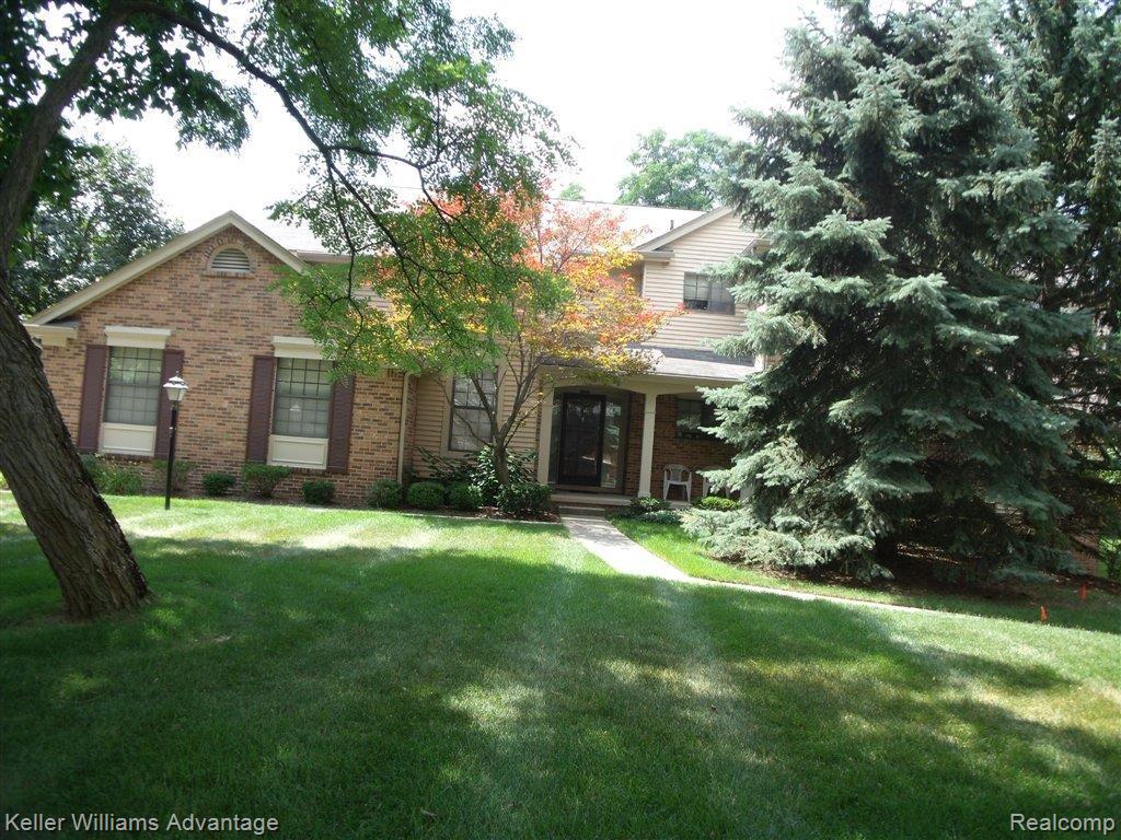 29703 Pine Ridge Circle, Unit 36 Farmington, MI 48331 - Photo 1 of 15 Front