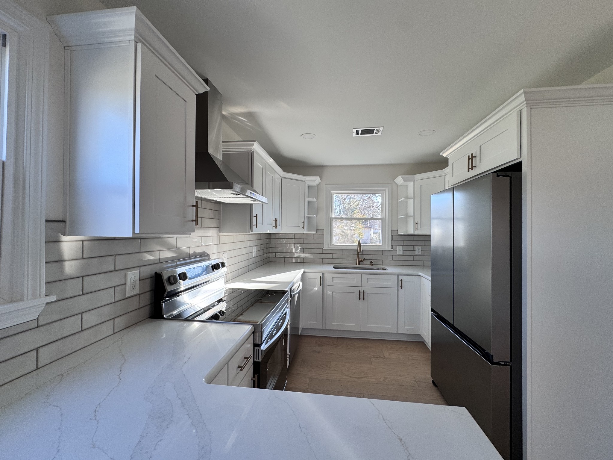 331 Oriel Avenue Nashville, TN 37210 - Photo 11 of 49 a kitchen with a sink appliances and cabinets