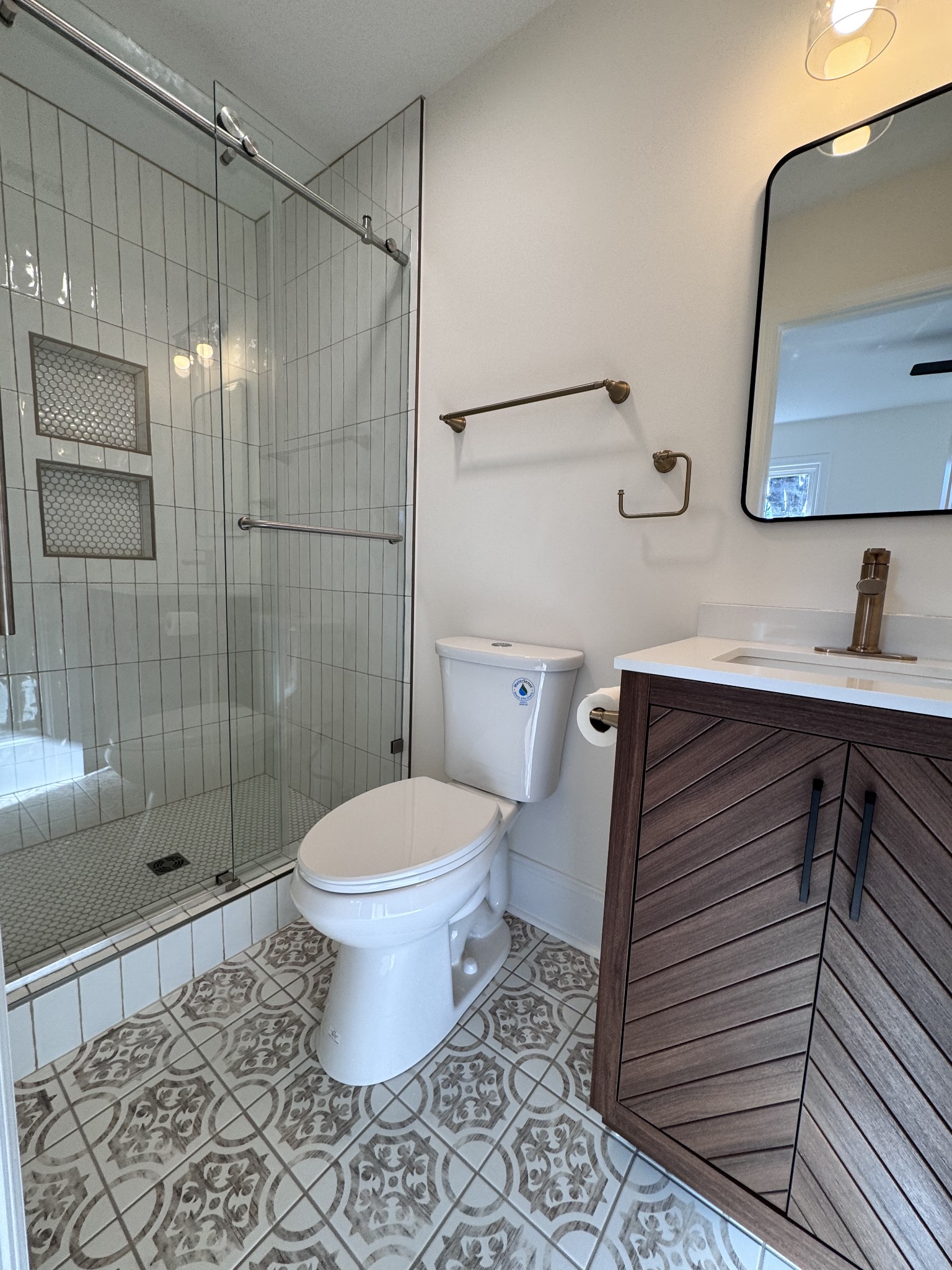 331 Oriel Avenue Nashville, TN 37210 - Photo 18 of 49 a bathroom with a toilet sink and shower