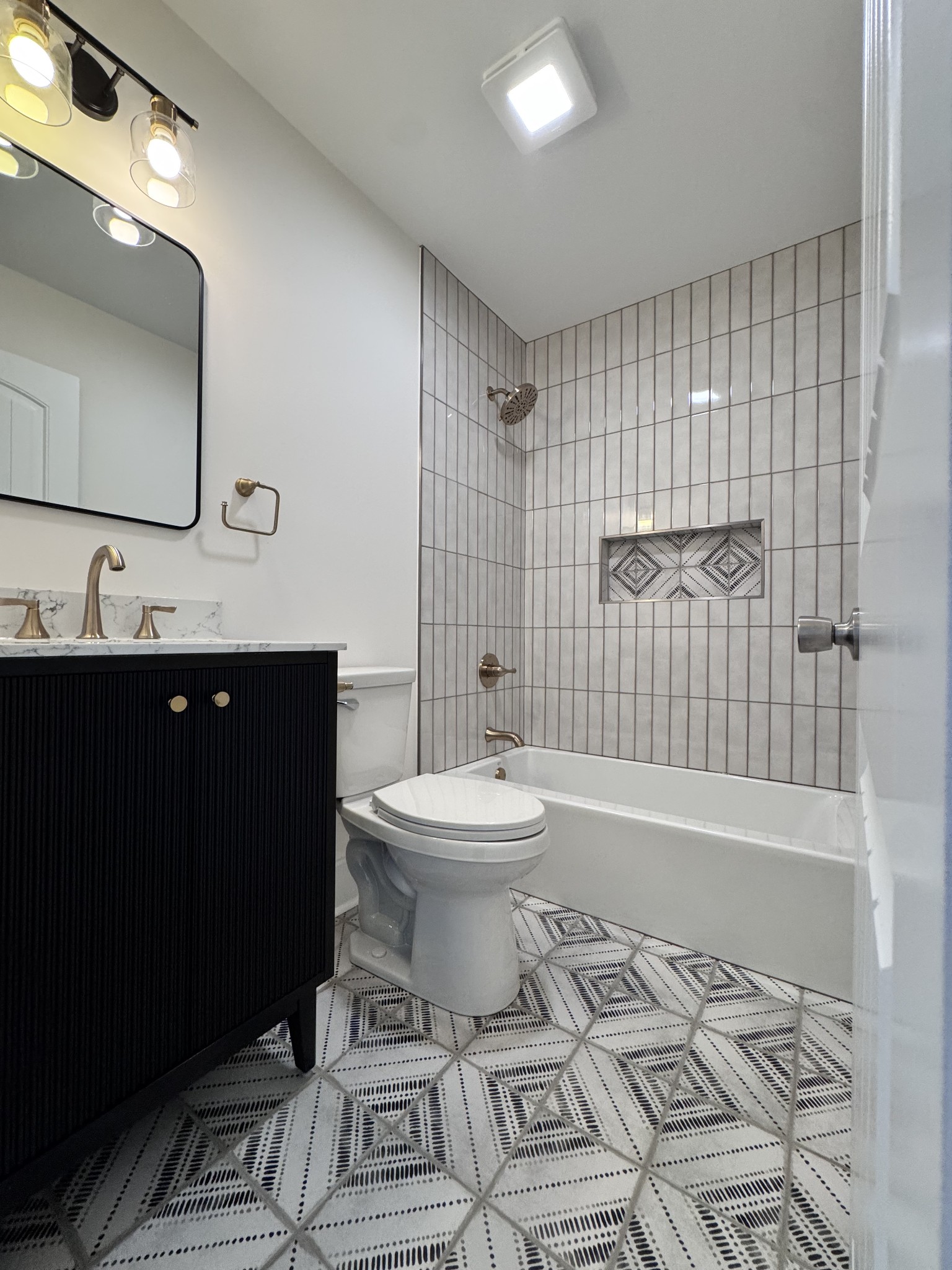 331 Oriel Avenue Nashville, TN 37210 - Photo 21 of 49 a bathroom with a toilet a sink and a mirror