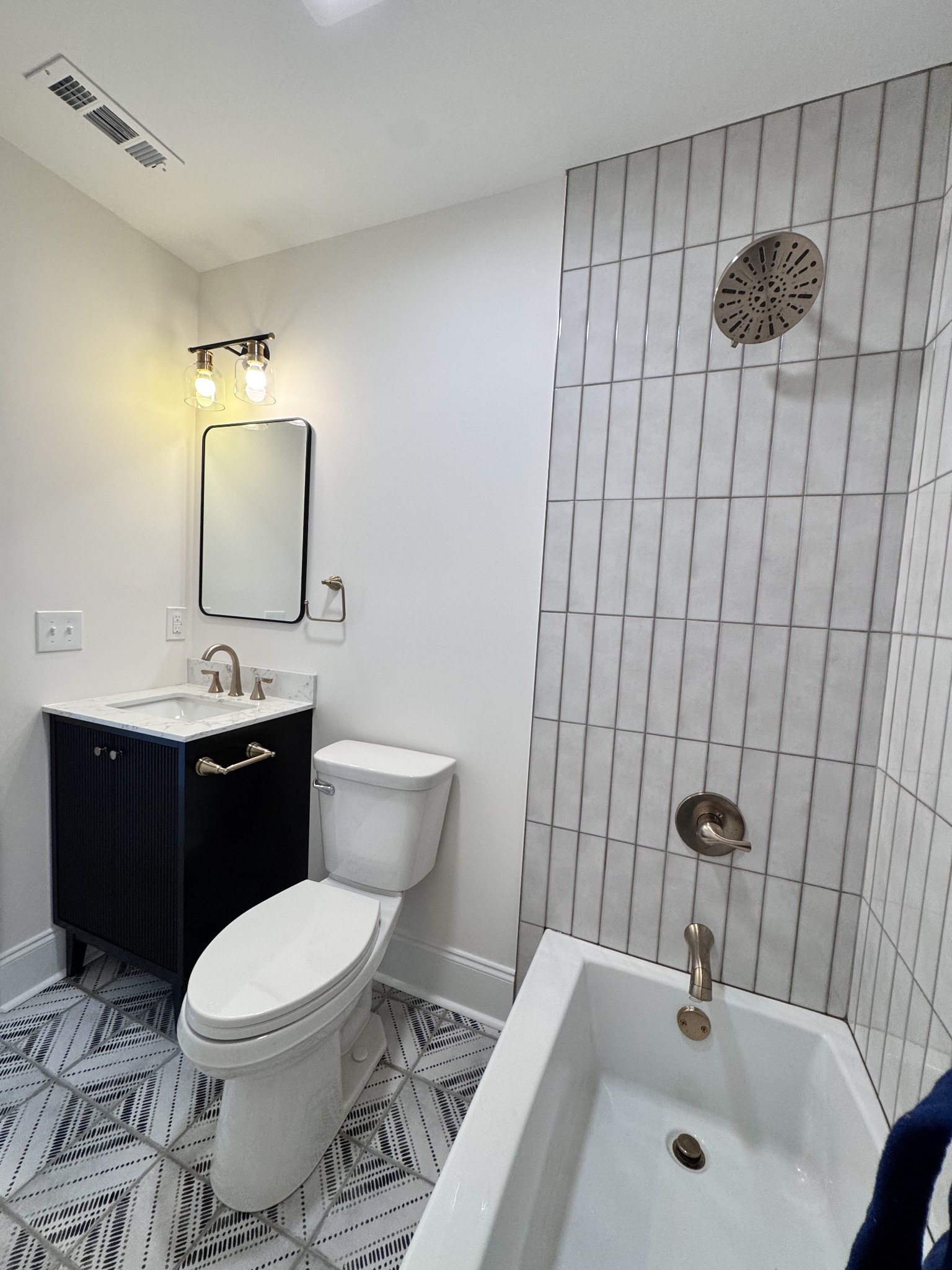 331 Oriel Avenue Nashville, TN 37210 - Photo 24 of 49 a bathroom with a sink a toilet and mirror