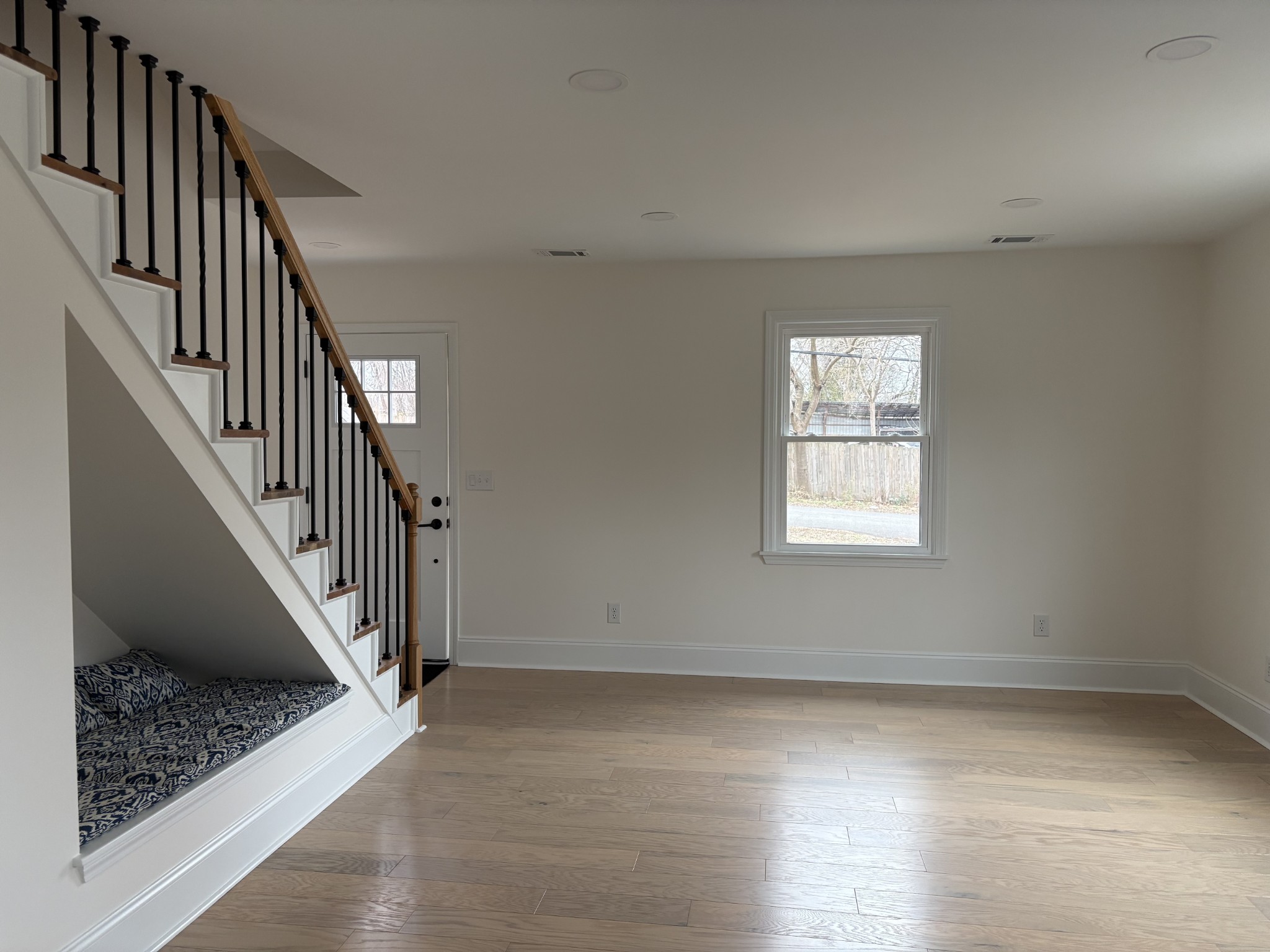 331 Oriel Avenue Nashville, TN 37210 - Photo 8 of 49 wooden floor in an empty room with a window