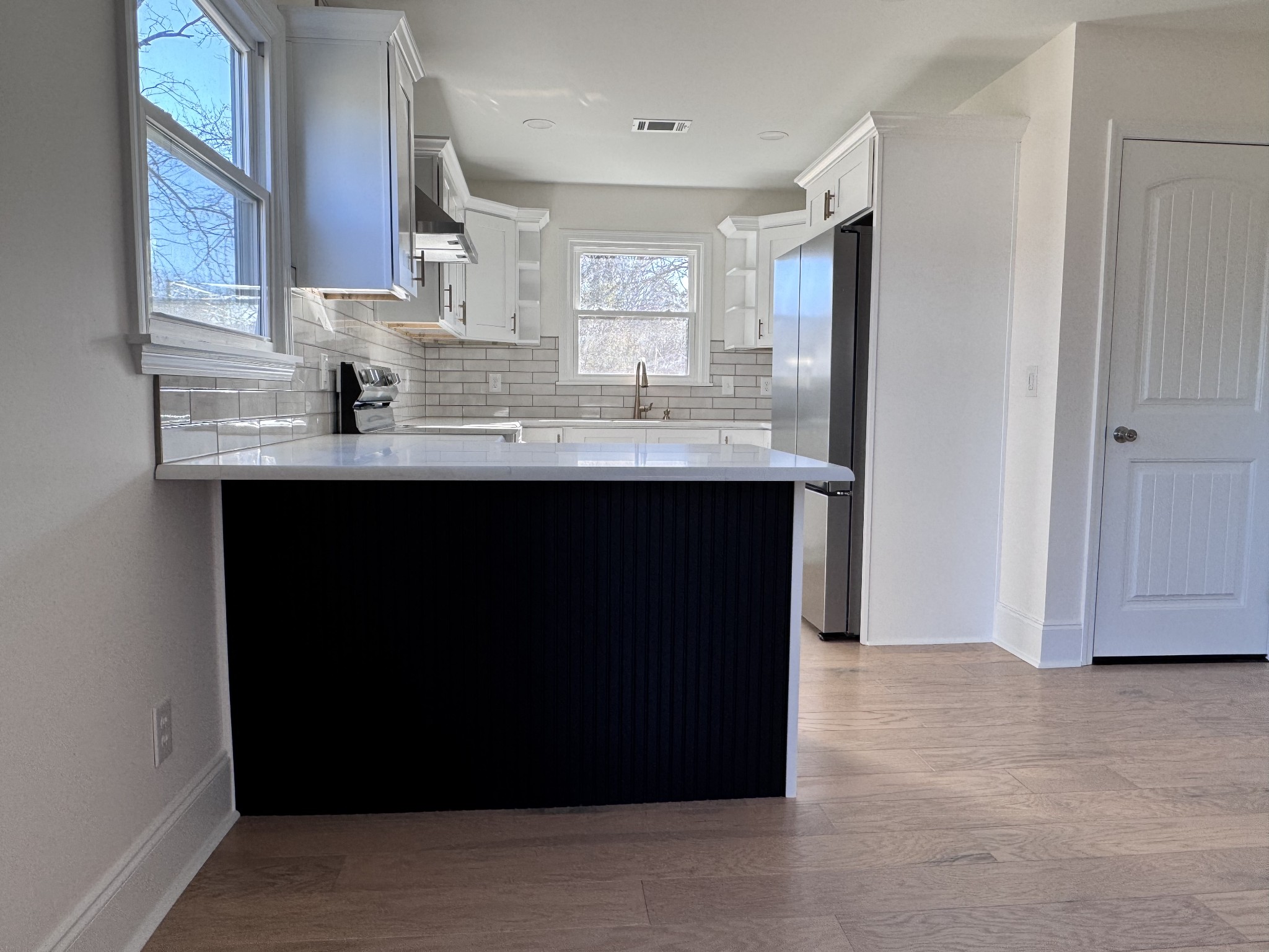331 Oriel Avenue Nashville, TN 37210 - Photo 10 of 49 a kitchen with stainless steel appliances granite countertop a refrigerator and a sink