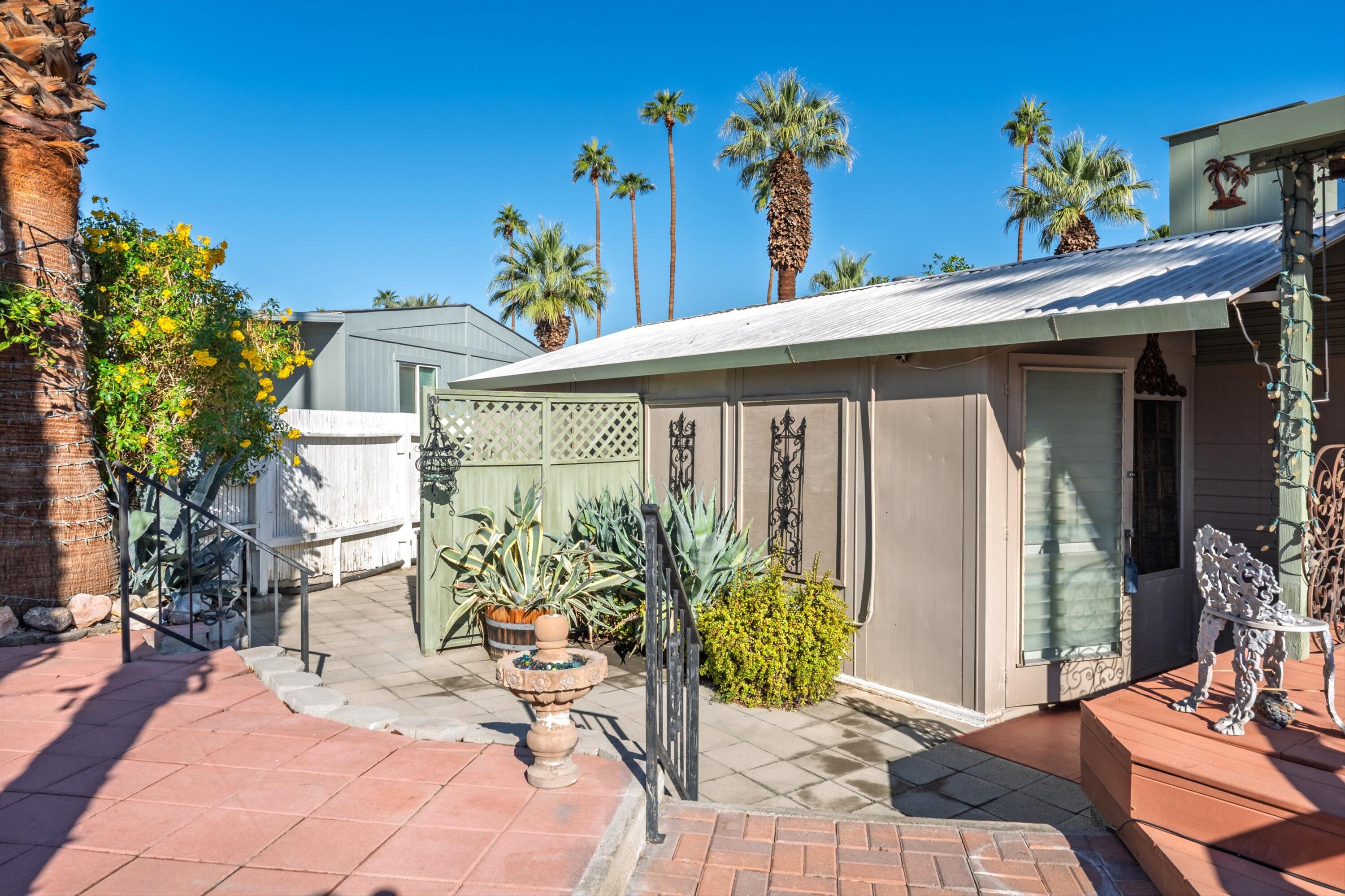 70260 Highway 111, Unit 42 Rancho Mirage, CA 92270 - Photo 12 of 35 a front view of a house