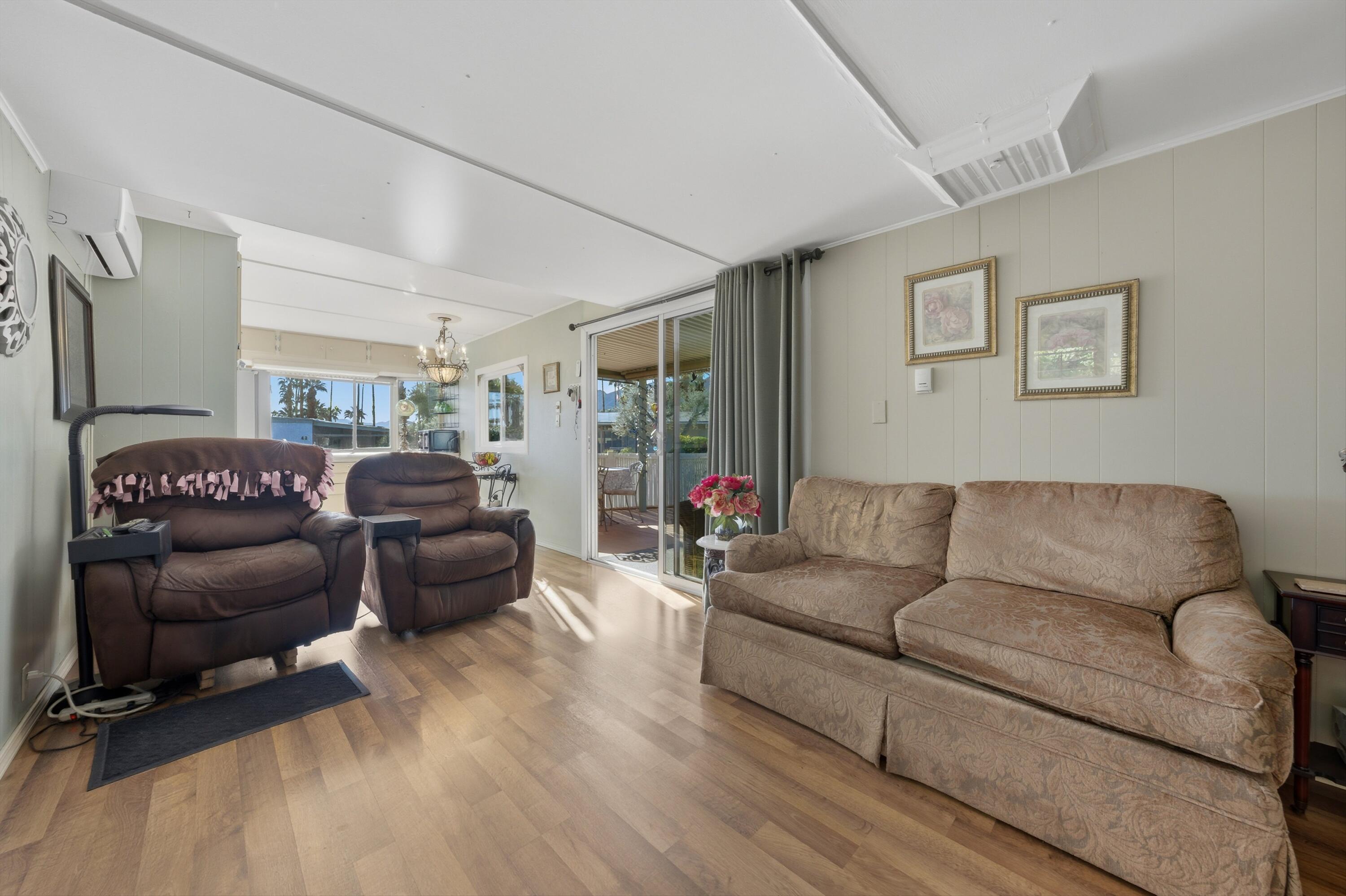 70260 Highway 111, Unit 42 Rancho Mirage, CA 92270 - Photo 18 of 35 a living room with furniture window and a couch