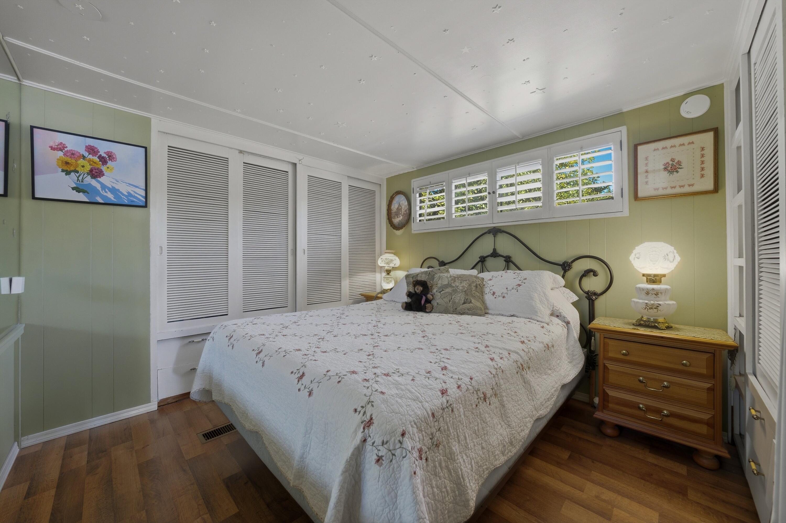 70260 Highway 111, Unit 42 Rancho Mirage, CA 92270 - Photo 22 of 35 a bedroom with a bed and a window