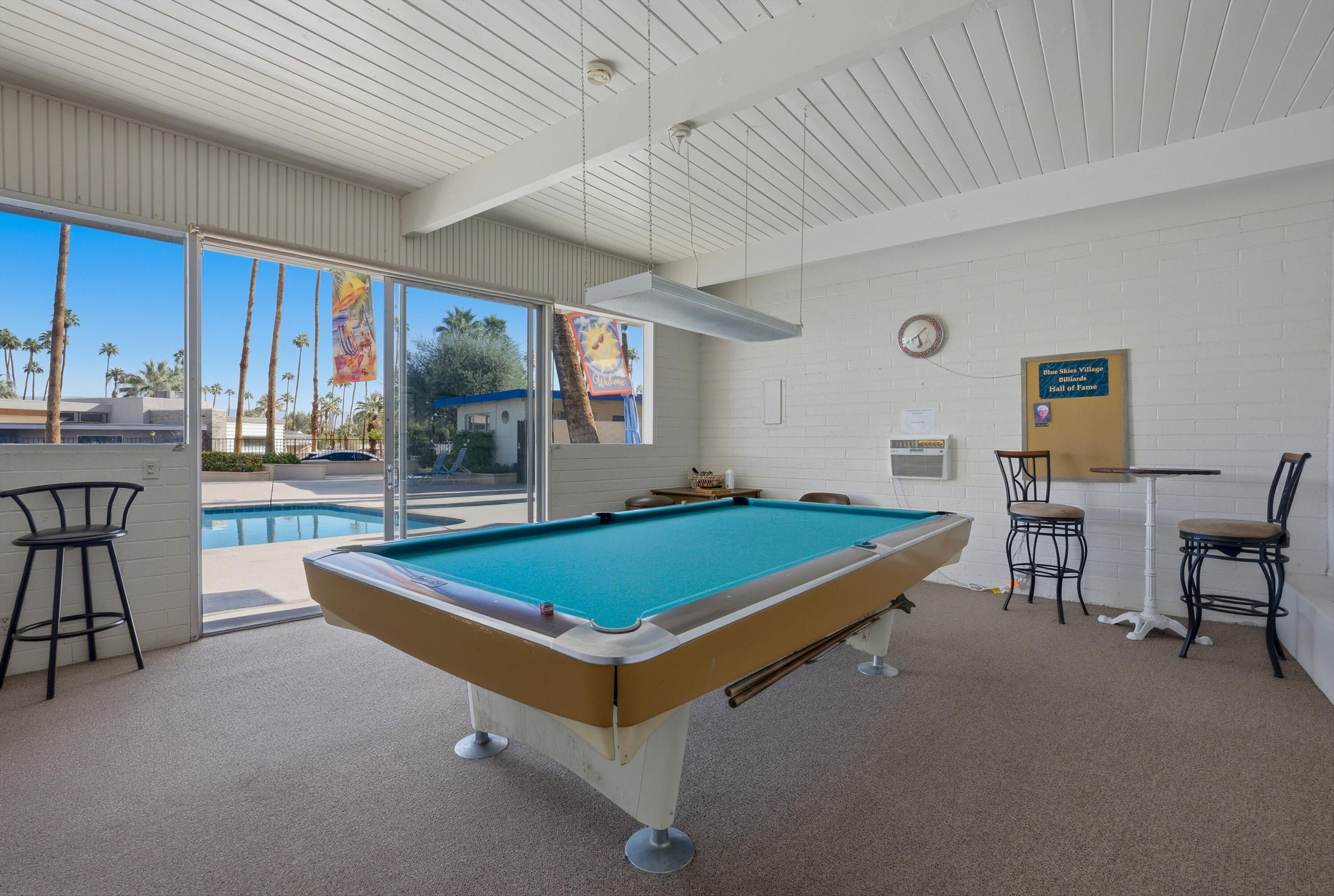 70260 Highway 111, Unit 42 Rancho Mirage, CA 92270 - Photo 33 of 35 a room with table tennis pool table and chairs