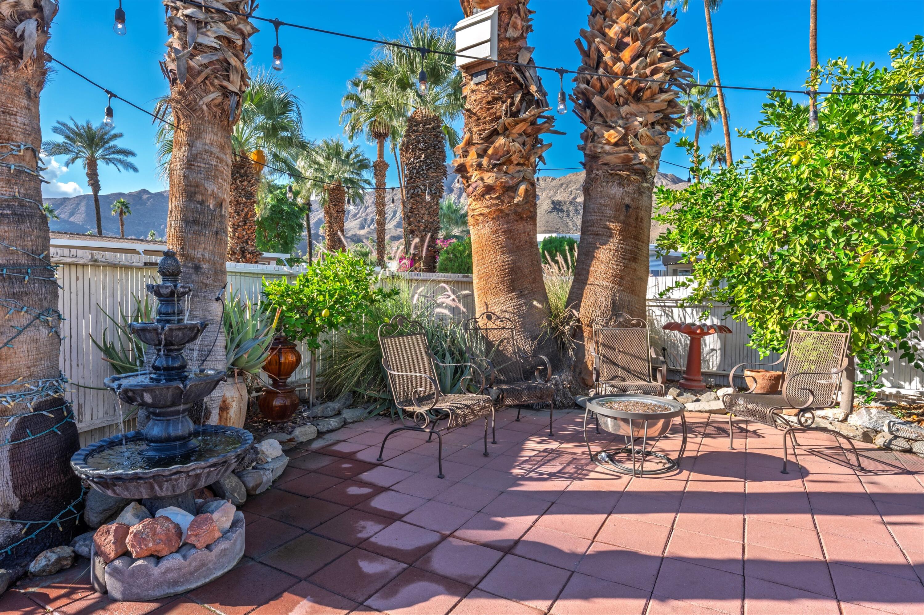70260 Highway 111, Unit 42 Rancho Mirage, CA 92270 - Photo 10 of 35 a view of a chairs and tables in the patio
