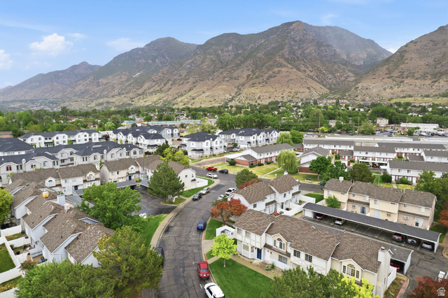 1099 South 950 East, Unit 17 Provo, UT 84606 - Photo 22 of 23 Residential community with a mountain backdrop, featuring townhomes and individual residences