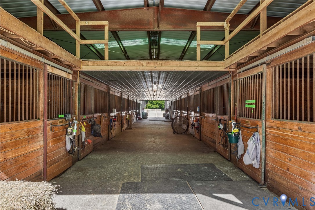 2016 Forge Road Toano, VA 23168 - Photo 6 of 99 Spacious barn interior featuring multiple wood-pan