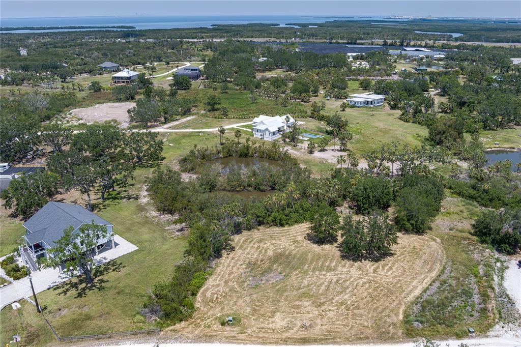 818 Bayou Point Terra Ceia, FL 34250 - Photo 12 of 17 an aerial view of residential houses with outdoor space and river