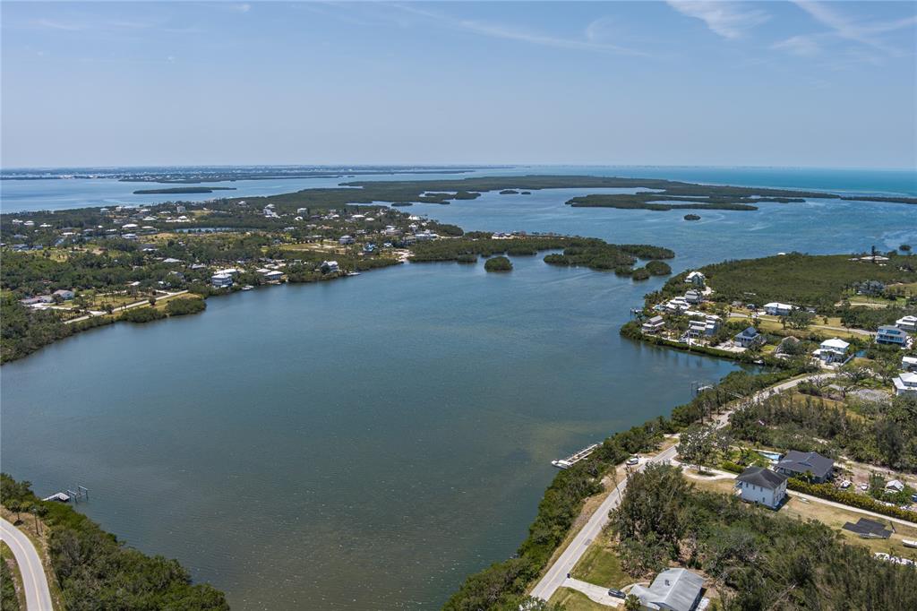 818 Bayou Point Terra Ceia, FL 34250 - Photo 15 of 17 an aerial view of ocean and residential houses with outdoor space