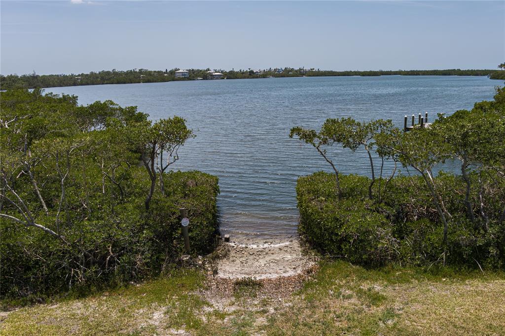 818 Bayou Point Terra Ceia, FL 34250 - Photo 17 of 17 a view of a lake with houses in the back