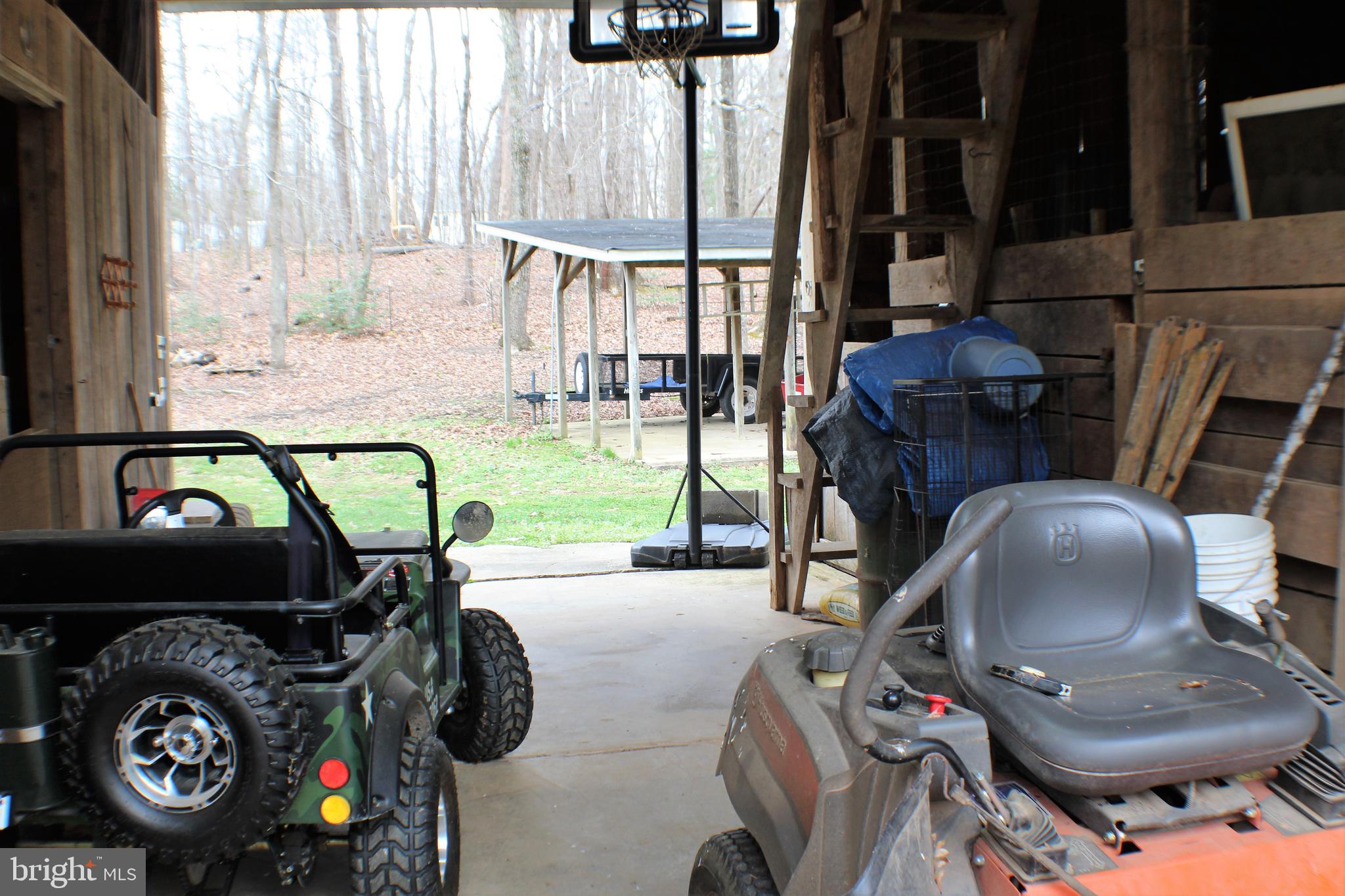 4249 Razor Hill Road Bealeton, VA 22712 - Photo 48 of 61 Barn door open concrete floor
