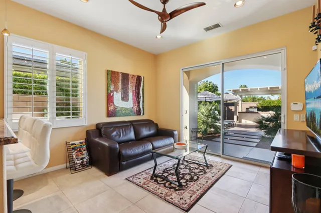 a kitchen with a sink and stainless steel appliances