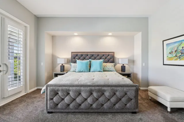 a bathroom with a sink double vanity and a mirror