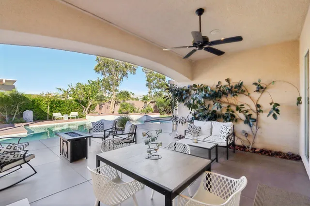 an aerial view of a house and a yard
