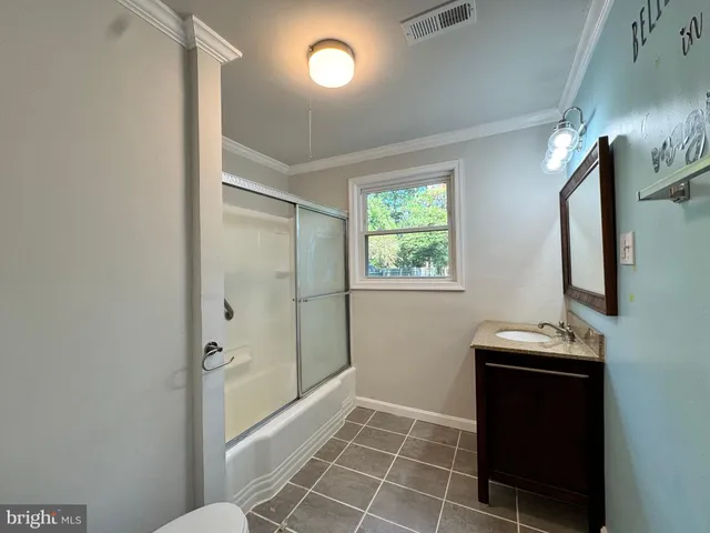 a room with furniture and a window