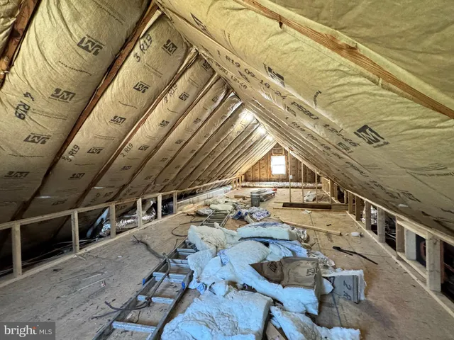 a view of a balcony with chairs
