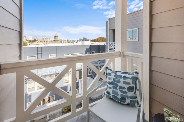 a backyard of a house with lots of green space and trees all around