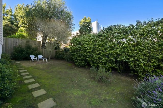 a front view of a building with street view