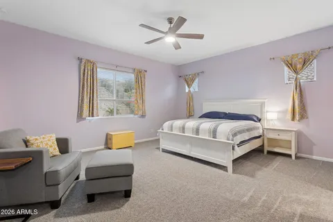 a living room with a couch and a flat screen tv