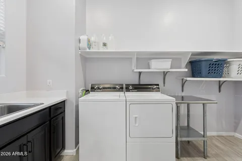a bathroom with a shower and a glass door