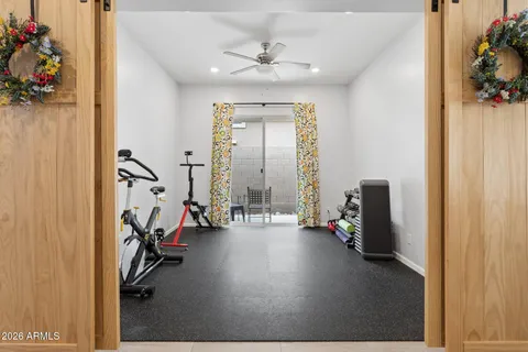 a view of a room with gym equipment