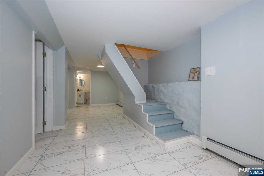 723 East 26th Street Paterson, NJ 07504 - Photo 18 of 41 a view of entryway and hall with a window
