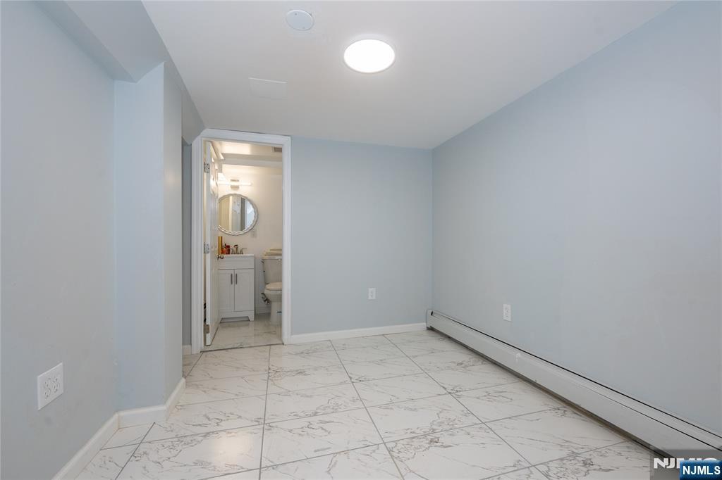 723 East 26th Street Paterson, NJ 07504 - Photo 19 of 41 wooden floor in a room